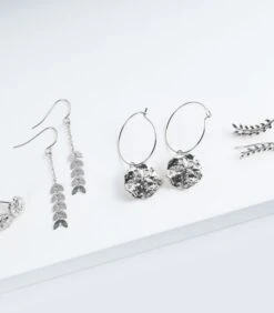 Geurkaars Kokosnoot Met Zilveren Oorbellen -Thuis Accessoires Winkel 26a7ce70540641e3beb51df666004979